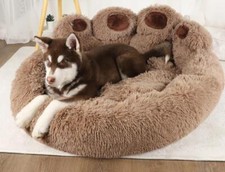 Kuschelbett in Pfotenform für