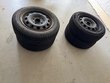 4 Winterreifen mit Felgen von Ford Fiesta 165- 65 R 14