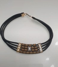 VINTAGE KAUTSCHUK UND STRASS
