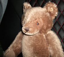 Teddy von Steiff mit Knopf im