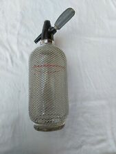 alter Syphon, Glas m. Metallnetz, schwer, rd.2,5kg, Sodasprayer, H.37cm Stand 9c