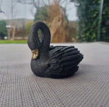 Schwarzer Schwan mit Glitzer