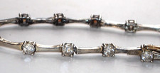 WEISSER SAPHIR- ARMBAND;925erSTERLINGSILBER; LÄNGE 19cm ,BREITE 0,5cm, 13 STEINE