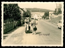Pair of Transported Suitcase