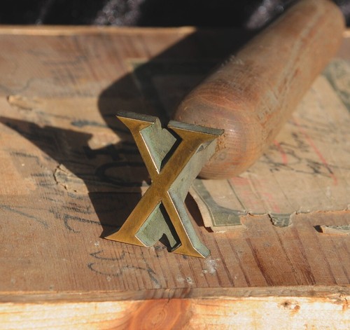 Buchstabe vergoldestempel - "x",