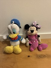 Zwei Disney Kuscheltiere