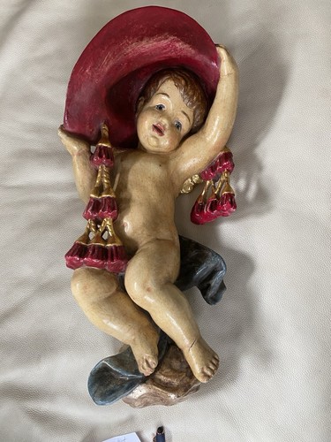 Putto mit kardinalshut - putto,