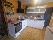 Helle gebrauchte 2xL Küchenzeile mit Siemens Elektrogeräten und Theke