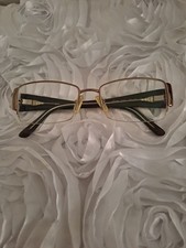 PRADA Brillengestell Damen Goldfarbenes Metall