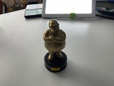 Burger King THE SIMPSONS MOVIE 4" Gold Statue COMICBUCH TYP Deutsche Sprache