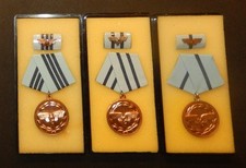 3 DDR Medaillen