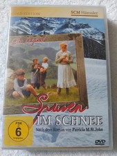 SPUREN IM SCHNEE DVD. FILM FÜR DIE GANZE FAMILIE. ROMAN VON PATRICIA M. ST. JOHN