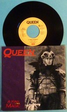 QUEEN - SINGLE 7" - A KIND OF MAGIC / A DOZEN RED ROSES FOR MY DARLING - MINT