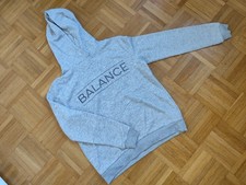 Grauer Kapuzenpullover Damen