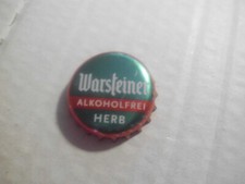 Gebrauchter, grün-rot-weisser Kronkorken Warsteiner ALKOHOLFREI HERB