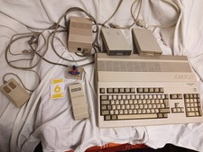 Commodore Amiga 500  mit Netzteil Disketten Bücher +Speichererweiterung