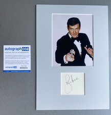 ROGER MOORE (†2017) "James