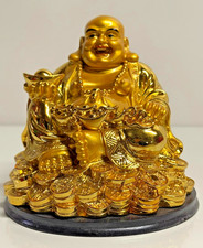 Goldene Glücksfigur –