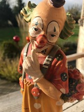 Clown mit Blumenstrauß, aus
