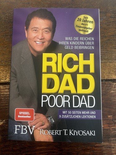 Robert kiyosaki rich dad - t.,