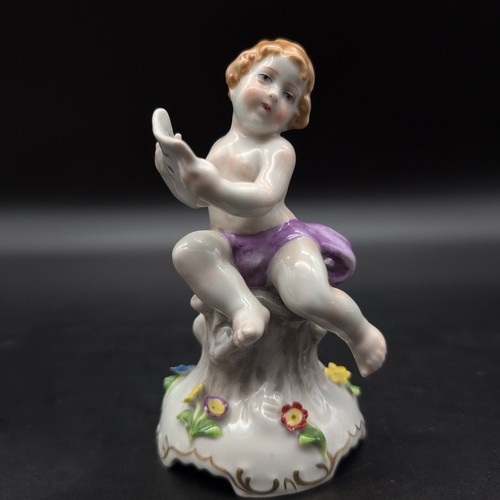 Porzellanfigur putto mit - porzellanfigur, blatt