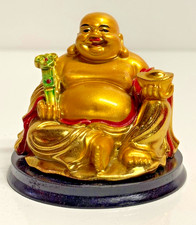 Goldene Glücksfigur –