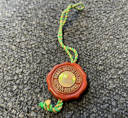 Rolex hang tag - hang, logo
