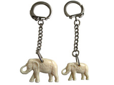 2 Seltene verschiedene Logo-Werbe-Figuren "MAMPE SPIRITUOSEN BERLIN" Werbung