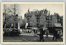 50442727 - Amsterdam Fahrrad Auto Schienen Fussgaenger