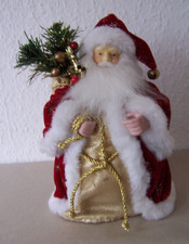 Weihnachtsmann-Figur; h: 22 cm; mit Geschenksack; 2 Flecken auf dem Goldstoff
