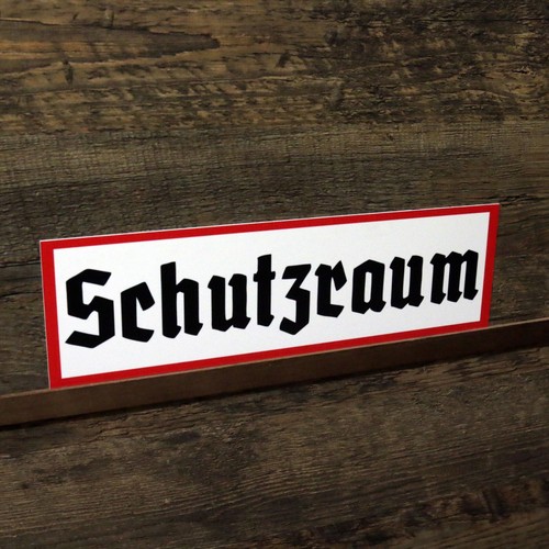 Schild schutzraum wegweiser - schild,