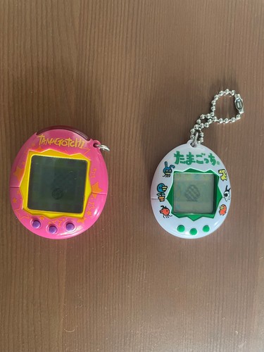 Tamagotchi magenta mit sternen - tamagotchi,
