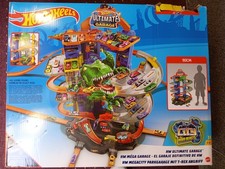 Hot Wheels Megacity Parkgarage mit T-Rex-Angriff