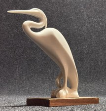 Reiher auf Holzplinte Sgrafo