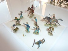 Cowboys reitend & zu Fuß 