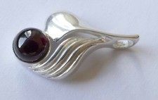 Anhänger brauner runder