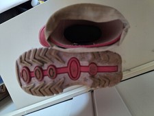 niedliche rosa Gummi-Stiefel