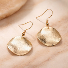 Vergoldete Ohrringe mit Rundem