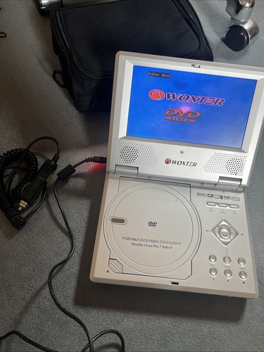 Dvd player portable woxter - dvd,