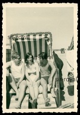 Pretty woman between two men