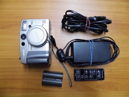 Canon powershot 4 - canon, •