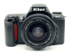 Nikon F65 + Tokina 35-70mm