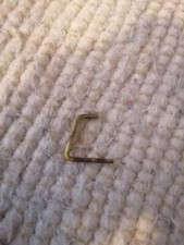 Clasp/clamp for tank cap tank