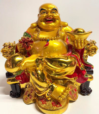 Goldene Glücksfigur –