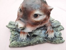 Schwimmtier otter auf stamm - auf,