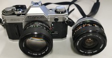 Canon AE-1 SLR-Kamera + 2 Objektive Canon FD 50mm 1:1.2 & 28mm 1:2.8 S.C.