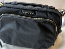 Tumi black solid crossbody bag - black,
