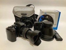 Konica Minolta DIMAGE A200 +