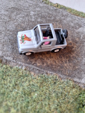 Modellauto 1:87 von RM  Rietze Suzuki  SJ 410  mit Fahrer