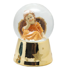 Schneekugel Engel orange sitzt